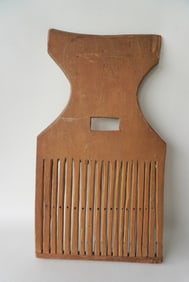 A primitive wooden tape loom, 19th century, signed J. B. J. on fish tail terminal. The owners name