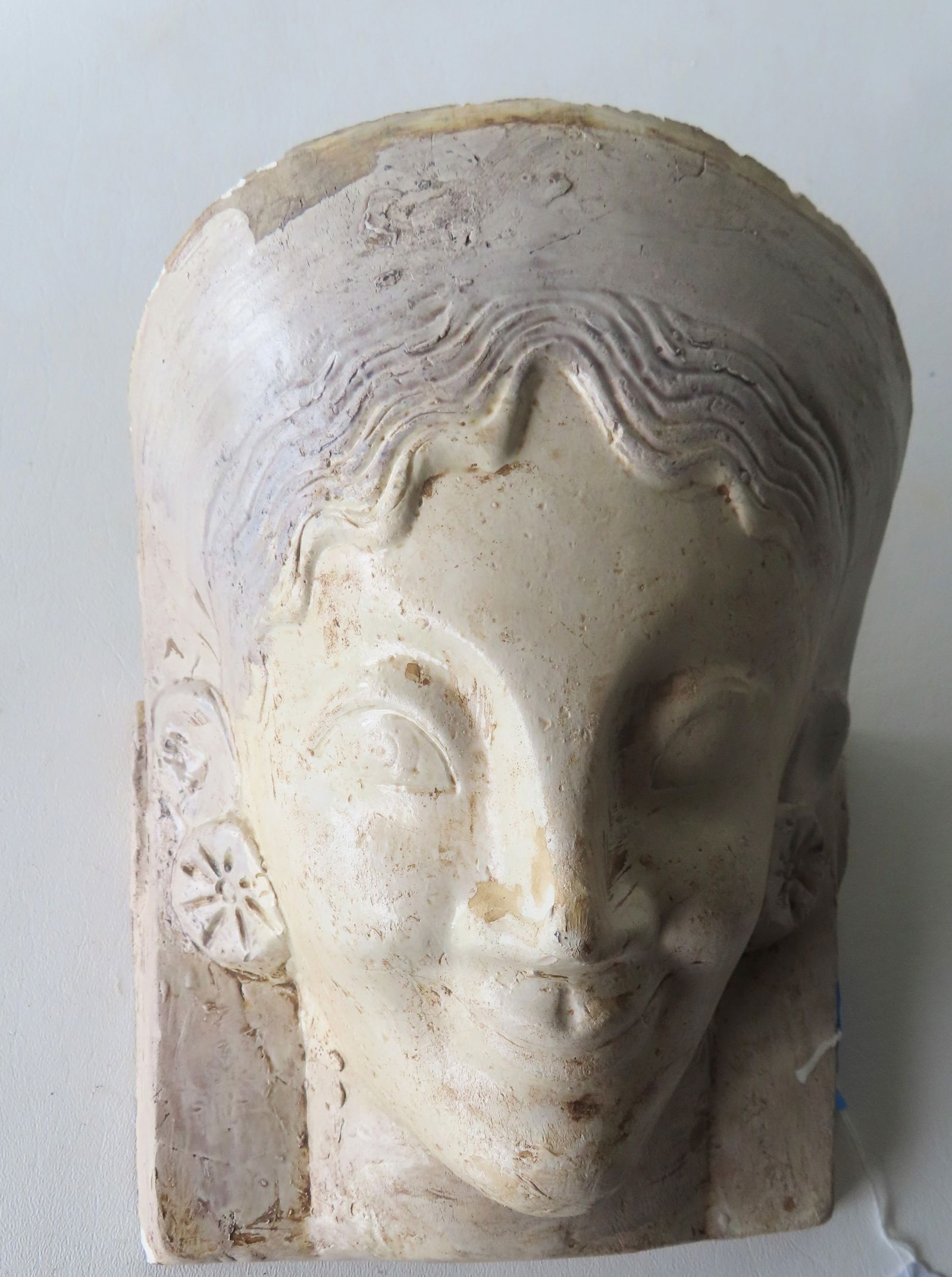 An Egyptian revival plaster death mask of lady, possibly a queen, hand painted in white and light: An Egyptian revival plaster death mask of lady, possibly a queen, hand painted in white and light blue paint, probably late 19th to early 20th century. Good condition. Measures approximately 8 1/4"W x