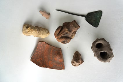 A grouping of 7 ancient artifacts including: Koban bronze clothing pin, North Caucasus, circa