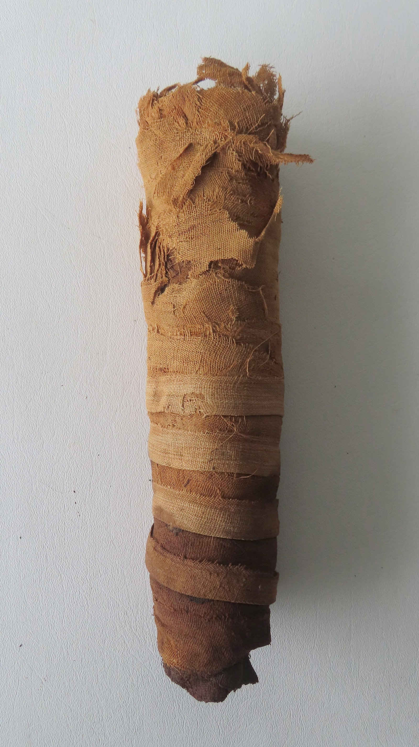 An ancient Egyptian mummified object wrapped in linen, possibly a bird or other small animal - has: An ancient Egyptian mummified object wrapped in linen, possibly a bird or other small animal - has not been x-ray's- circa 1 BC or earlier. The linen with some external wear as could be expected other