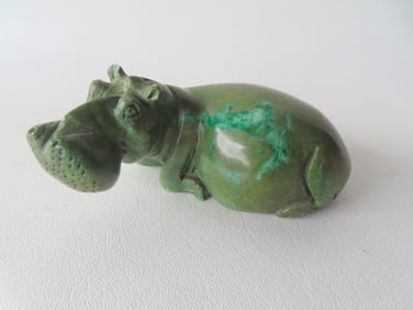 A polished marble sculpture of a hippopotamus, excellent details and in very good condition.