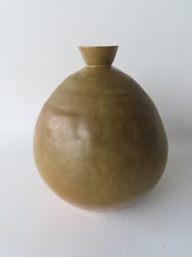 Stoneware bud vase, hand shaped with flared rim, mat green glaze, early to mid 20th century.