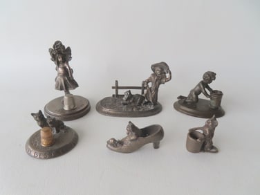 Grouping of 6 miniature figural sculptures, all likely 19th century, including 3 thimble holders: