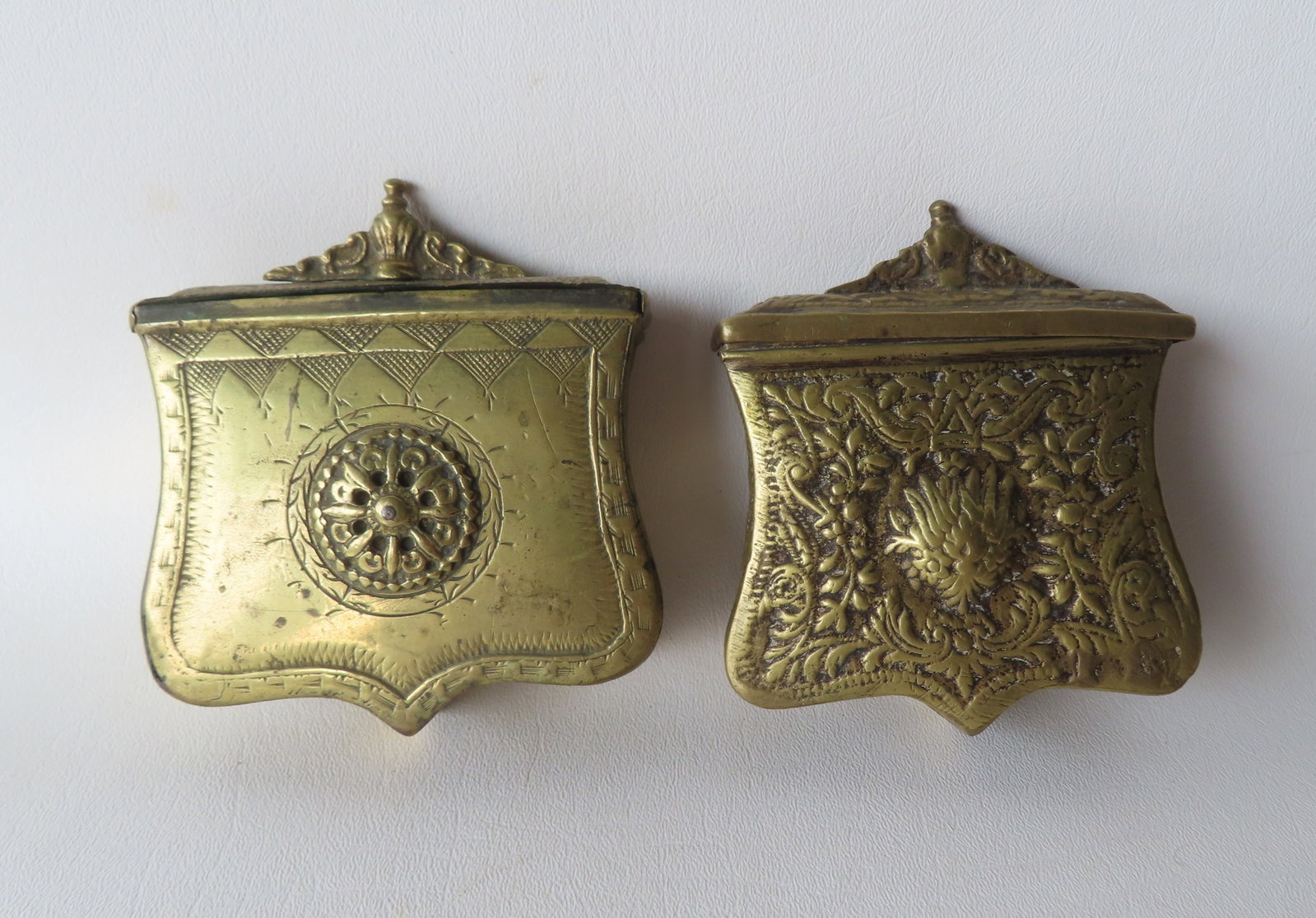 Two brass Ottoman shield shaped cartridge boxes with belt loops, circa 1850 - both in very good: Two brass Ottoman shield shaped cartridge boxes with belt loops, circa 1850 - both in very good condition - each approximately 4"W x 4 1/2"H. Provenance: From a Rochester NY estate, name withheld by f