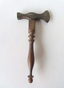 A very fine hand made sugar hammer, having a very refined turned black walnut handle and hardened