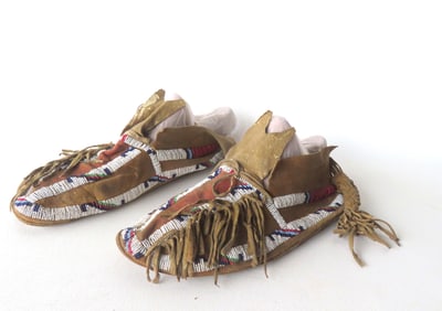 A pair of Native American beaded moccasins, probably late 19th to early 20th century - both
