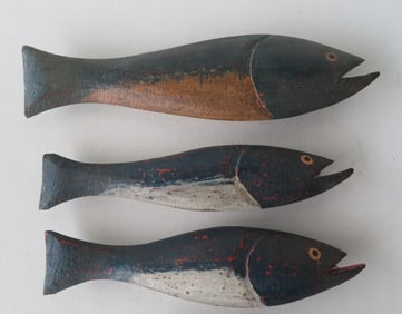 Three hand carved wooden decorative fish in original paint, mid to late 20th century. Two with