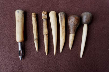 rouping of 6 short whalebone fids, and one whalebone sail maker's sewing awl, 19th century, all with