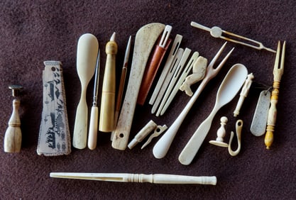 Various grouping of whalebone tools, and ornaments, including some with losses. All late 19th to e