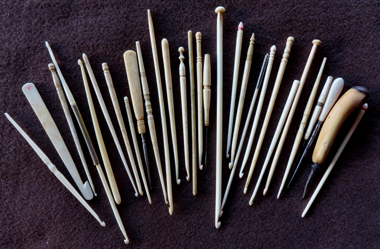 Grouping of 29 whalebone and ivory crochet hooks, 19th century, all with patina and use wear consist: Grouping of 29 whalebone and ivory crochet hooks, 19th century, all with patina and use wear consistent with age and in very good condition. The largest measures 8"L. Provenance: From the estate of Je