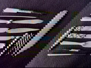 Grouping of 11 bone household tools including fountain pen, 2 letter openers, file, double edge croc