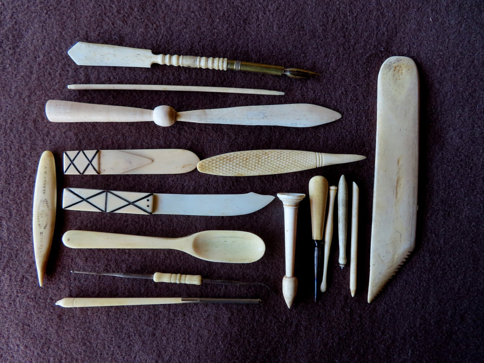 Grouping of 11 bone household tools including fountain pen, 2 letter openers, file, double edge croc: Grouping of 11 bone household tools including fountain pen, 2 letter openers, file, double edge crochet hook, spoon, etc., late 19th century. All items with patina and use wear, consistent with age an