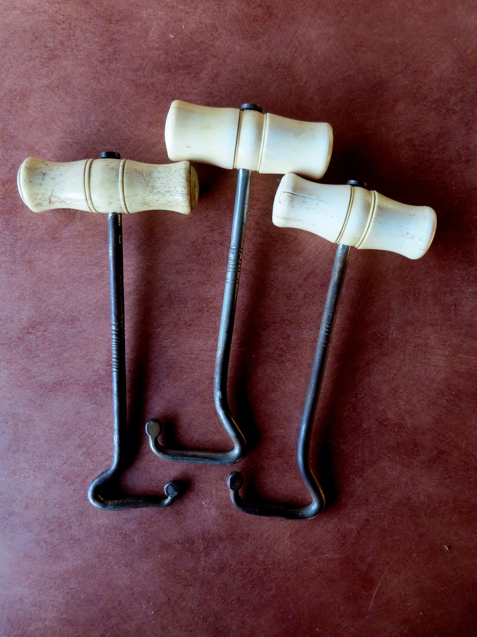 Three whalebone boot hooks, late 19th century. All with good patina and use wear consistent with age: Three whalebone boot hooks, late 19th century. All with good patina and use wear consistent with age, and in very good condition. Each approximately 7 1/4"L x 3 1/2"W. Provenance: From the estate of J