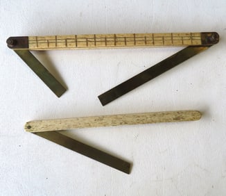 Two whalebone nautical measuring instruments.