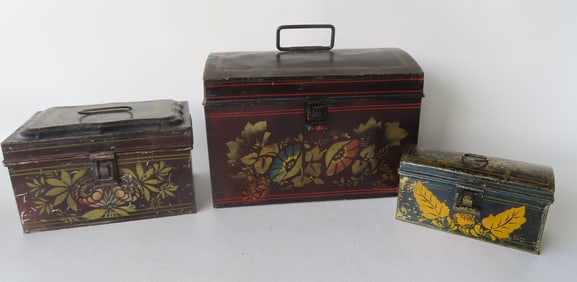 Three toleware boxes in original paint and stenciling. The largest with dome top, measures 11 1/4"W