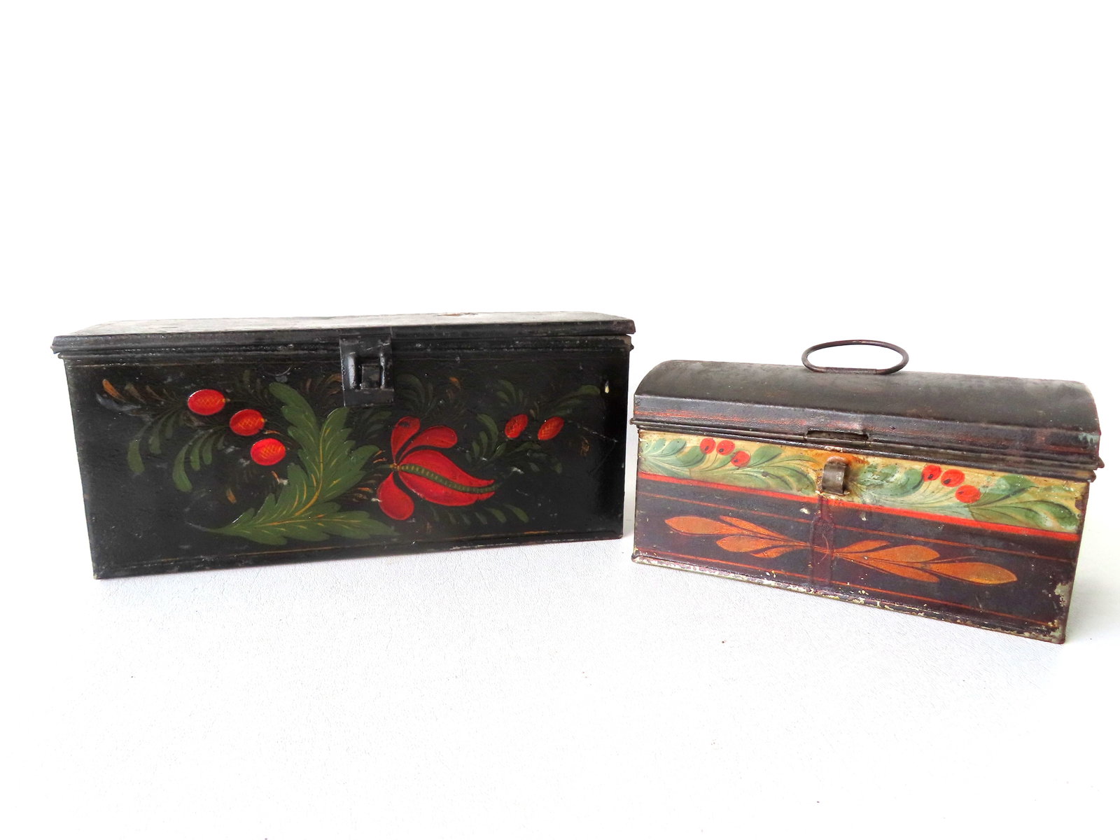 Two toleware boxes, both mid 19th century. Some use wear to paint, but overall very good condition.: Two toleware boxes, both mid 19th century. Some use wear to paint, but overall very good condition. The largest, with fitted interior and hand painted with cherries, measures 9 3/4"W x 3"D x 4 1/4"H -