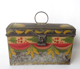 A well decorated and hand painted dome top toleware box in original paint, early 19th century. Some