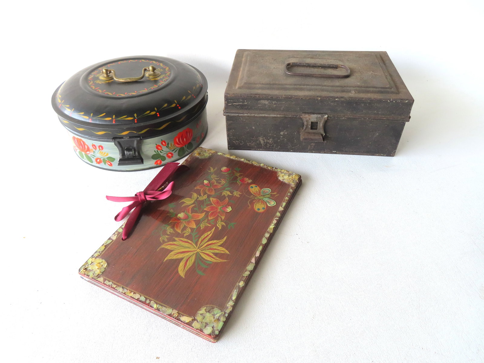 Three pieces of early toleware including: Spice box with 7 interior canisters - mid to late 19th: Three pieces of early toleware including: Spice box with 7 interior canisters - mid to late 19th century in late 20th century paint - measures 8 1/2" diameter x 3 1/2"H; another spice box with 6 inter