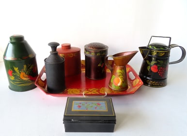 Grouping of 8 pieces of toleware, most 19th century, in newer repaint. A tea caddy with hand