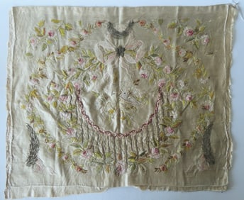 A beautiful hand stitched unframed silk embroidery having a central floral leaf with bow,