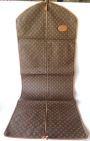 A Louis Vuitton monogrammed travel garment bag - a small blemish in leather on reverse side hardly