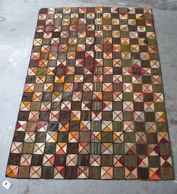 A good hooked rug dated 1899. Some losses to wool, but it is not worn and has a new backing, so it