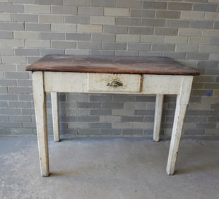 A primitive 1 drawer oak kitchen work table with scrubbed top with breadboard ends