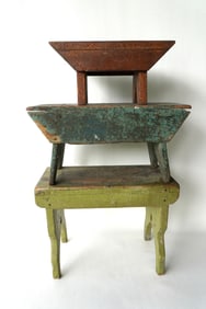 Three primitive cricket stools in old paint, including one in old blue-green paint (worn), late 19th