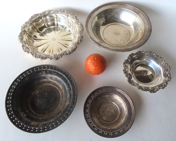 Grouping of 5 sterling plates and bowls - the largest measures 10" diameter x 2 1/4"H. Total weight