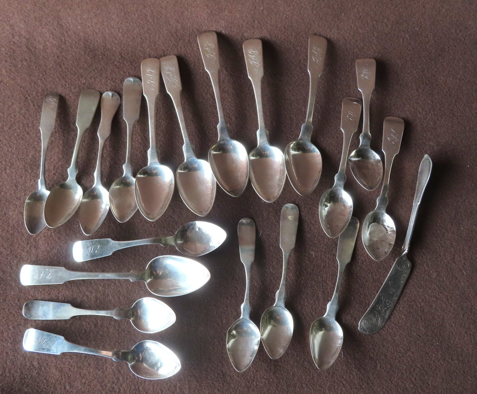 Grouping of coin silver including 6 William Thomson spoons (NY), 5 teaspoons W.I. Tenney (NYC),: Grouping of coin silver including 6 William Thomson spoons (NY), 5 teaspoons W.I. Tenney (NYC), other spoons including Hoyer, Adams, Pitkin, etc. Total weight 13 troy oz. of pure silver.