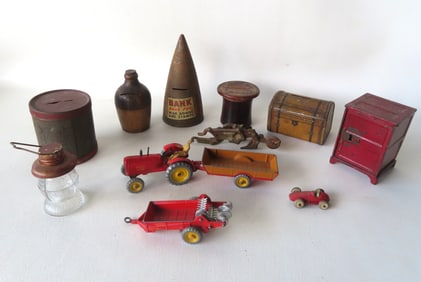 Grouping of vintage toys including 6 still banks, a signed T.H. Stough & Co. colorless glass candy