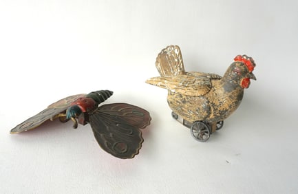 Two early mechanical tin toys in original paint including a windup mouth - working condition but