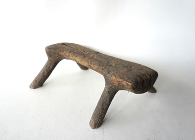 An unusual small size farm made wooden chopping block, natural formation from tree trunk