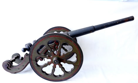 A hand made breech loading wooden cannon model in original paint, 19th century.