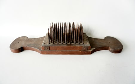 A good primitive hatchel in original finish, early 19th century.