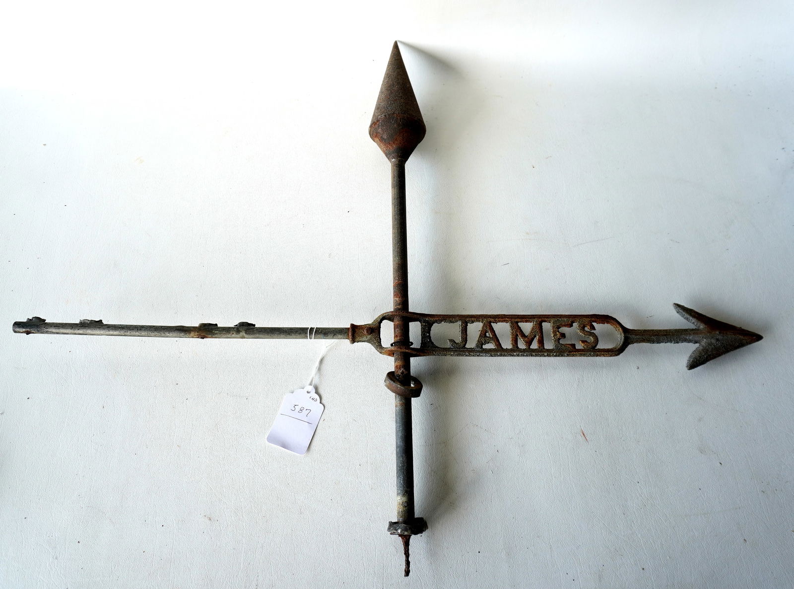 A "James" lightening rod fragment, 19th century.: A "James" lightening rod fragment, 19th century. Missing feathers and mounted animal but retains arrow marked "JAMES". Measures 32 1/4"H x 26 1/2"H. Provenance: From the Marni Bakst and William Sadler