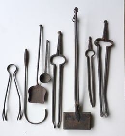 Grouping of mostly hand forged iron hearth items, 18th/19th century.