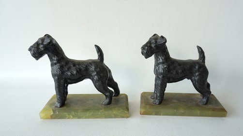 A pair of Scottie dog bookends mounted on green alabaster bases, circa 1930.