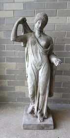 A cast stone garden sculpture of a classical partially nude lady, early 20th century. Note the