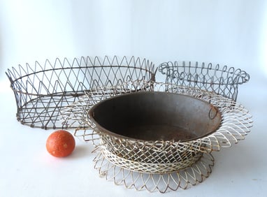 Three wire basket form plant holders, early to mid 20th century, all in good condition. The largest
