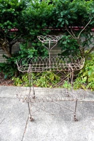 A Victorian wire 3 tier plant stand in natural finish (the layered paint has been scraped off - no