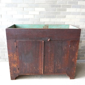 A good grain painted dry sink in original brown and muster colored paint (darkened varnish finish),