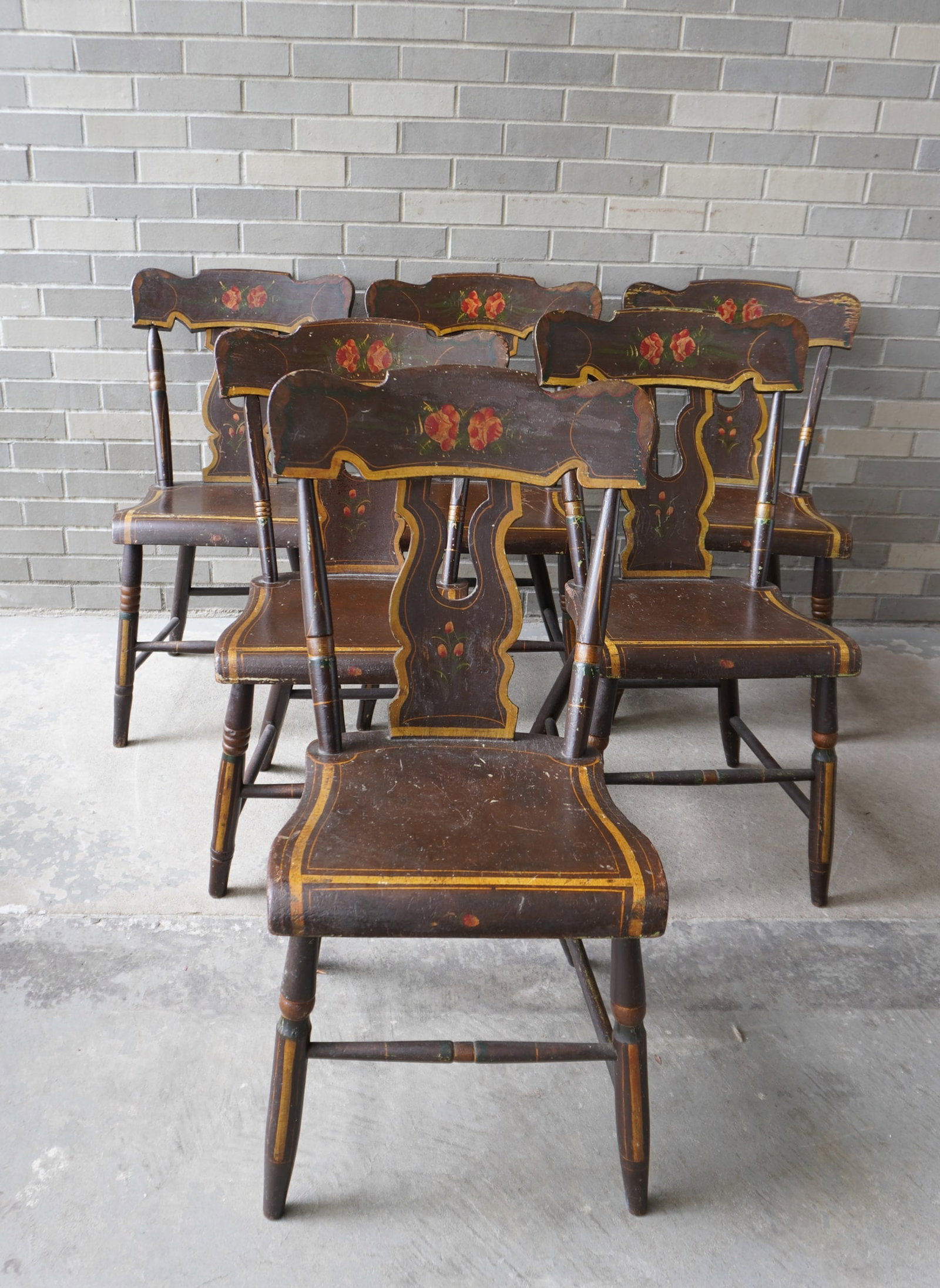 A set of 6 Pennsylvania stenciled and hand painted country chairs with the impressed signature of: A set of 6 Pennsylvania stenciled and hand painted country chairs with the impressed signature of "J. Swint / Chair Maker" on underside of seat - John Swint, Lancaster County, PA cabinetmaker - known 