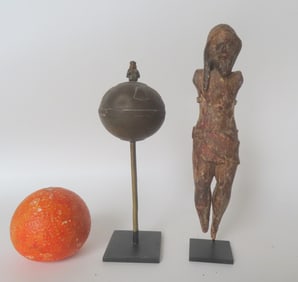 Two early religious collectibles including: A small carved wooden retablo of a crucified Jesus in