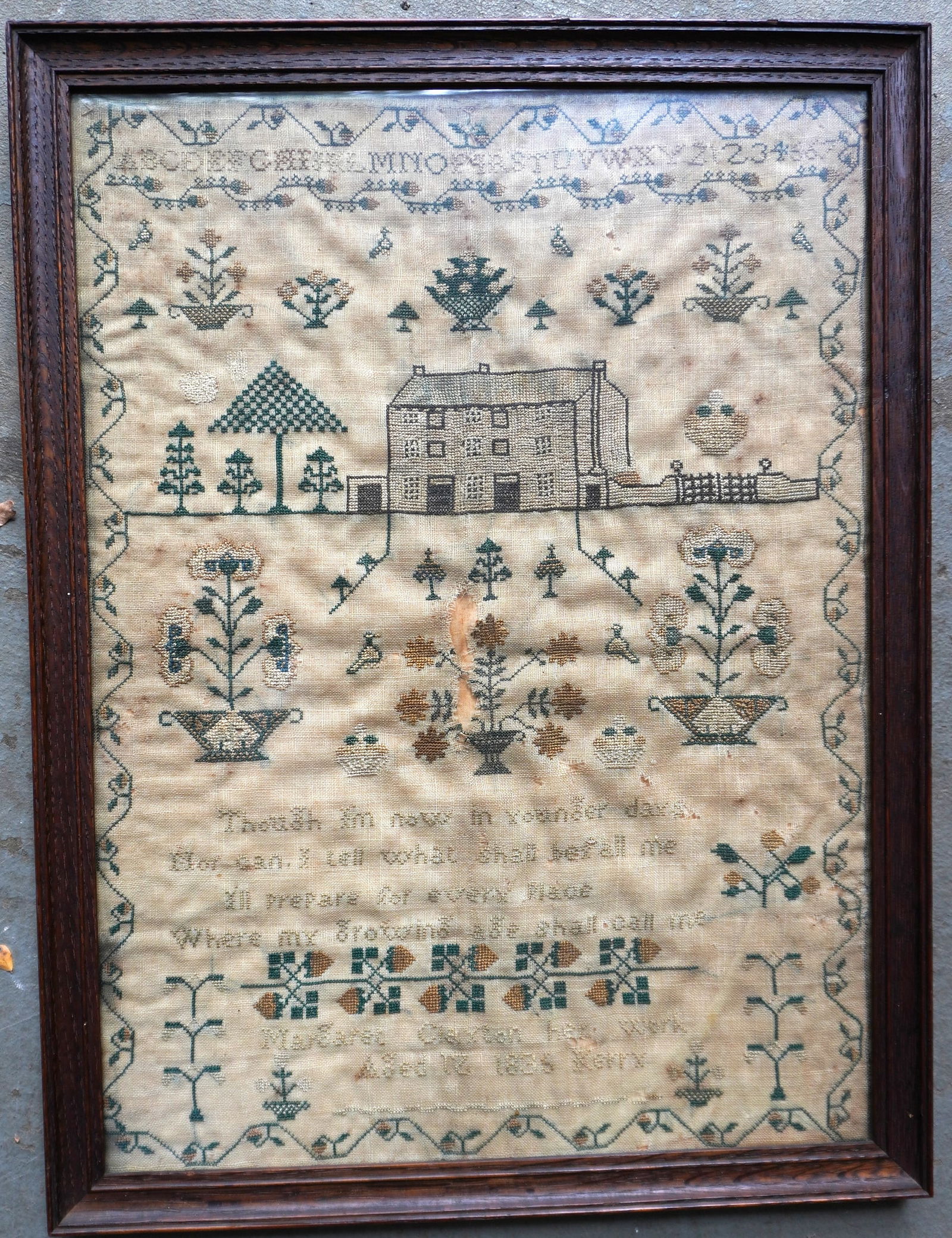 A pictorial alphabet and verse sampler decorated with house with a double wide fence and trees over: A pictorial alphabet and verse sampler decorated with house with a double wide fence and trees over flower plants and birds over a 4 line verse signed "Margaret Clayton Her Works / aged 12 1836 Kerry"