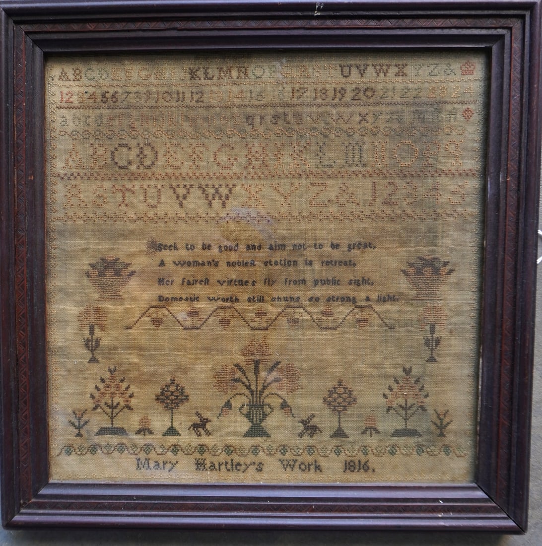 An alphabet, poetic and pictorial sampler signed "Mary Hartley's Work 1816". Note the poetic verse: An alphabet, poetic and pictorial sampler signed "Mary Hartley's Work 1816". Note the poetic verse regarding woman's value, that reads "Seek to be good and not to be great. A woman's nobler station is