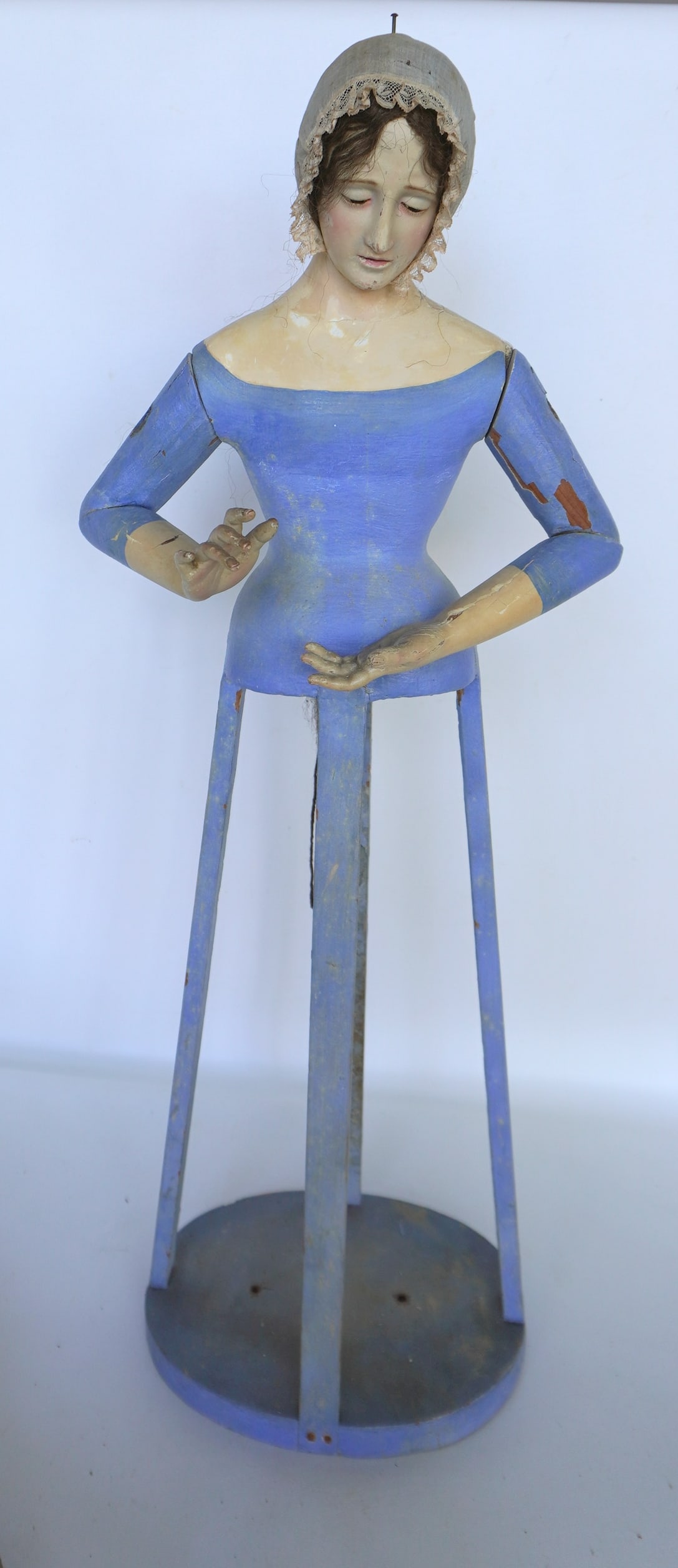 Large carved wooden Spanish Colonial Santos cage doll depicting the Virgin Mary with glass eyes and: Large carved wooden Spanish Colonial Santos cage doll depicting the Virgin Mary with glass eyes and in original paint - the costume is hand sewn and may be original. The silver crown is removable and