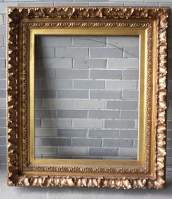 A large very fine gilt gesso frame, rococo style, circa early 19th century. Several small chips to