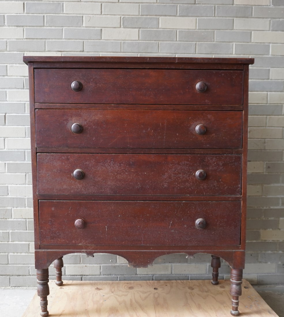 A good Sheraton cherry chest having 4 graduated beaded drawers with original wooden pulls and with: A good Sheraton cherry chest having 4 graduated beaded drawers with original wooden pulls and with shaped aprons on front and sides and standing on high turned legs, circa 1820. Note that each drawer