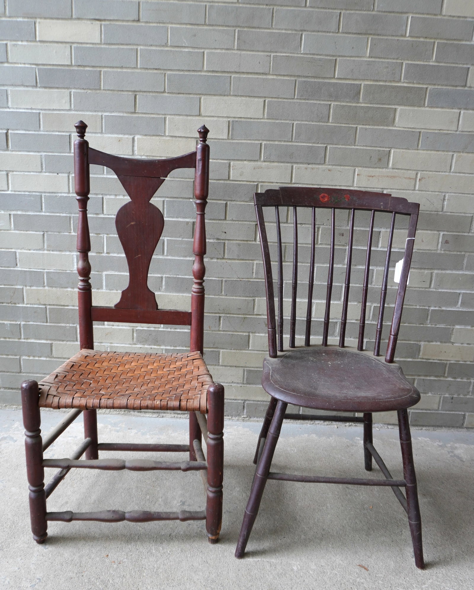 Two early country chairs. The first a step-down Windsor chair with original floral painting on back: Two early country chairs. The first a step-down Windsor chair with original floral painting on back splat - the paint is very dirty and appears all original with a dark green color; the second a good